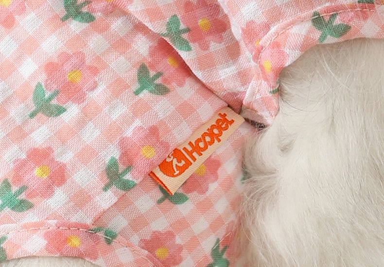 Summer thin anti-shedding vest for kittens in floral pink pattern with orange label.