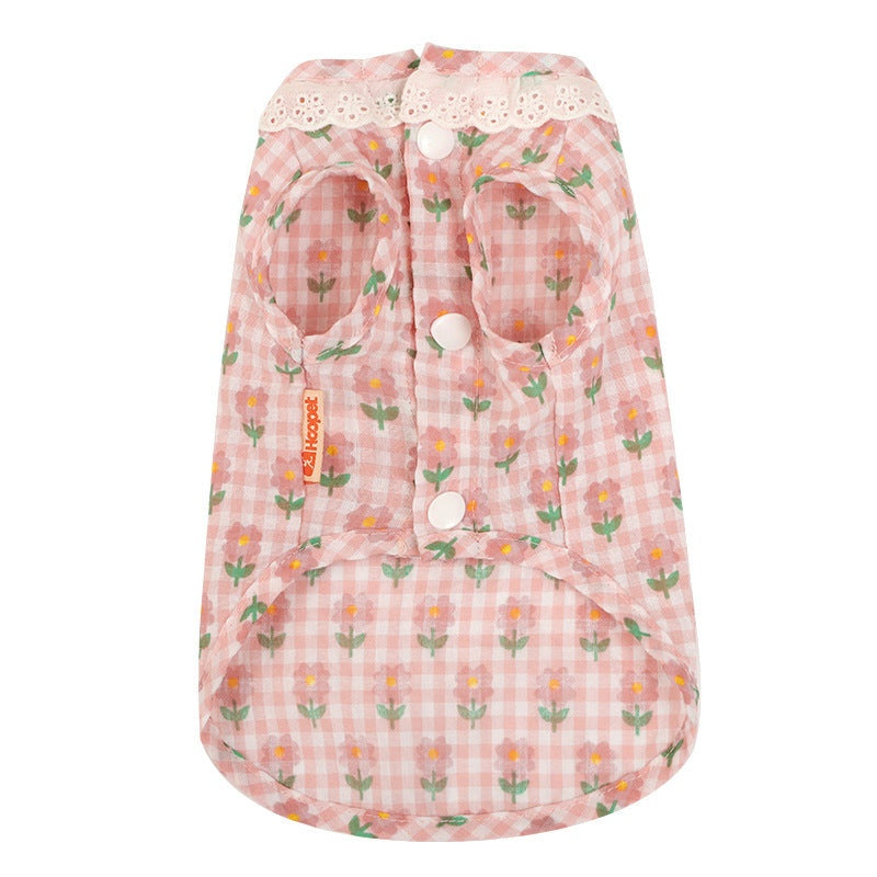 Pink floral anti-shedding vest for kittens with button closure.