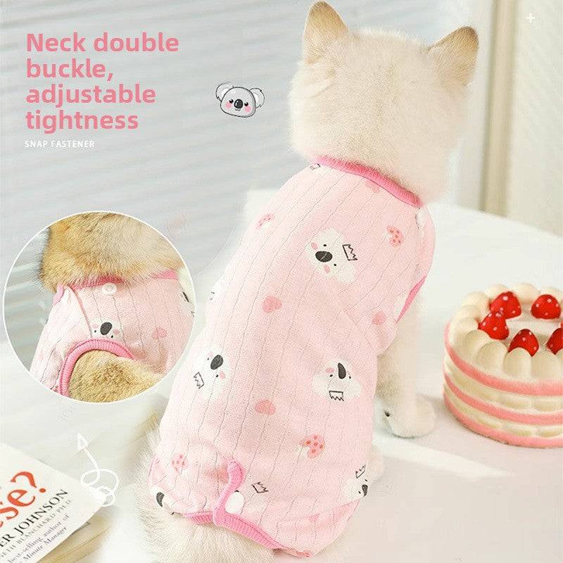 Cat wearing pink anti-shedding clothes with cute designs and adjustable neck buckle.
