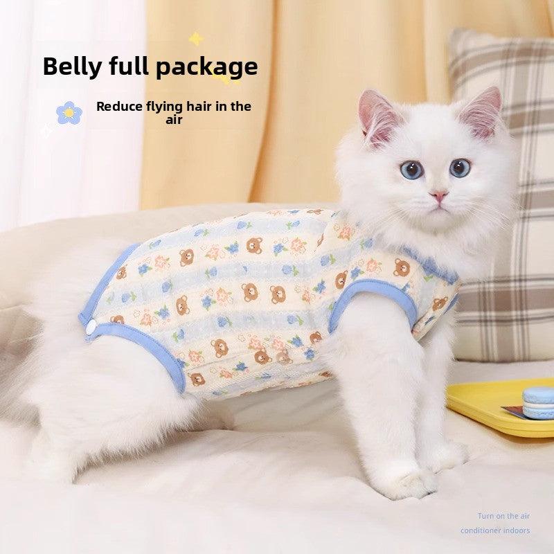Kitten wearing anti-hair loss belly cover with cute owl print, ideal for summer comfort.