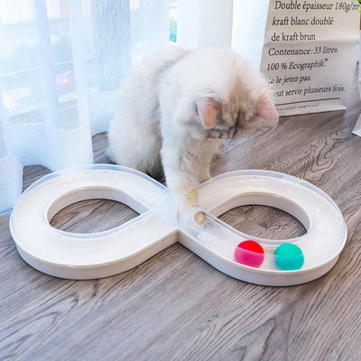 Interactive cat toy set with spinning wheel and colorful balls, ideal for kittens.