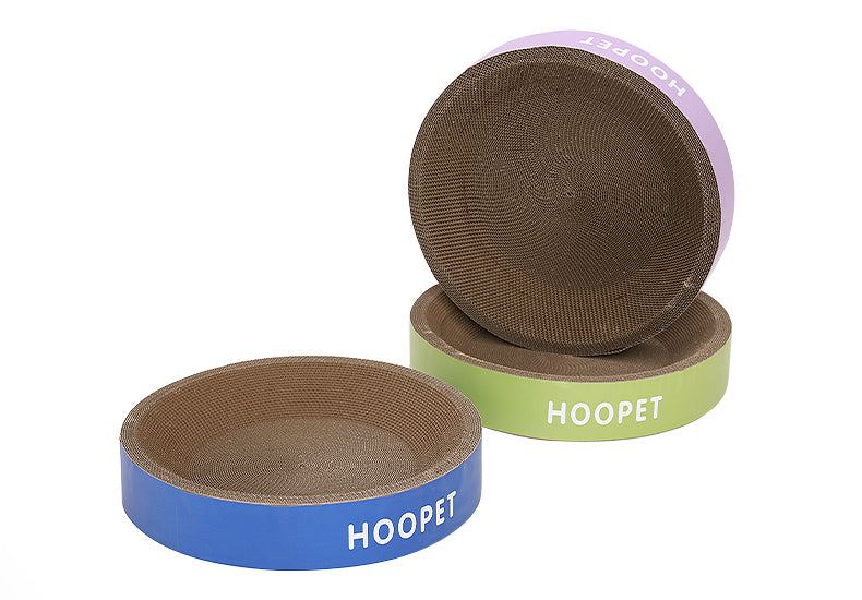 Durable eco-friendly cat scratch board bed in purple, blue, and green.