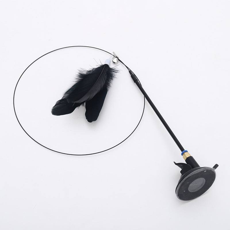 Cat toy with steel wire, feather teaser, and suction cup base for self-amusement.
