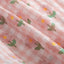 Lightweight pink fabric with floral and checkered pattern for summer kitten vest.