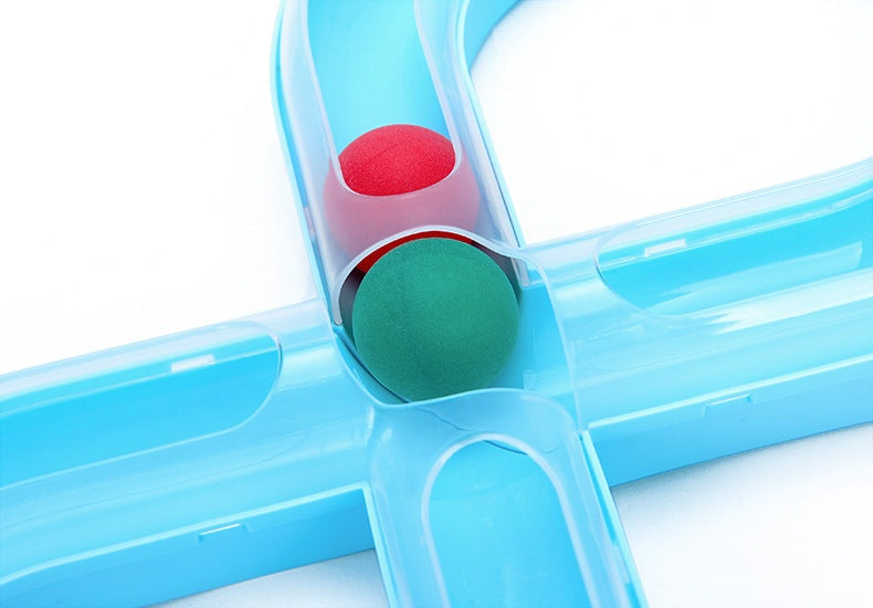 Interactive cat toy set featuring a spinning wheel track with colorful balls for playful kittens.
