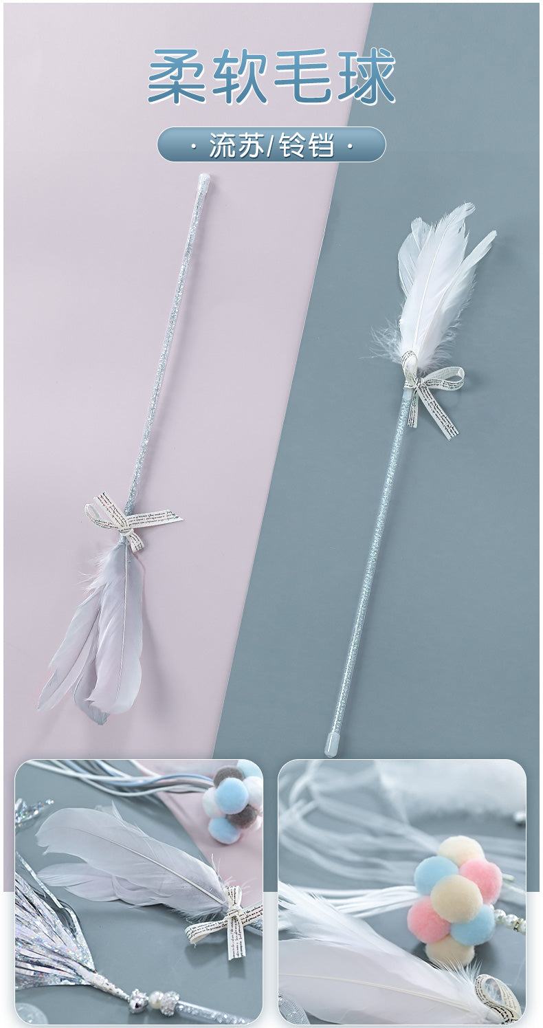 Cat teaser wand with feathers and bells, ideal for kitten play.