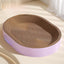 Eco-friendly durable cat scratch board bed in a pastel pink oval design, perfect for non-shedding comfort.