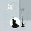Cat toy with steel wire teaser and feather, featuring a strong suction cup base for durability and self-amusement.