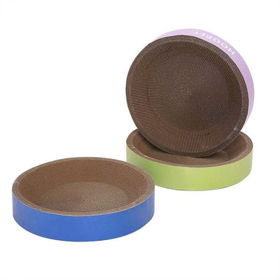 Durable cat scratch board bed, non-shedding, eco-friendly design, in colorful round shapes.