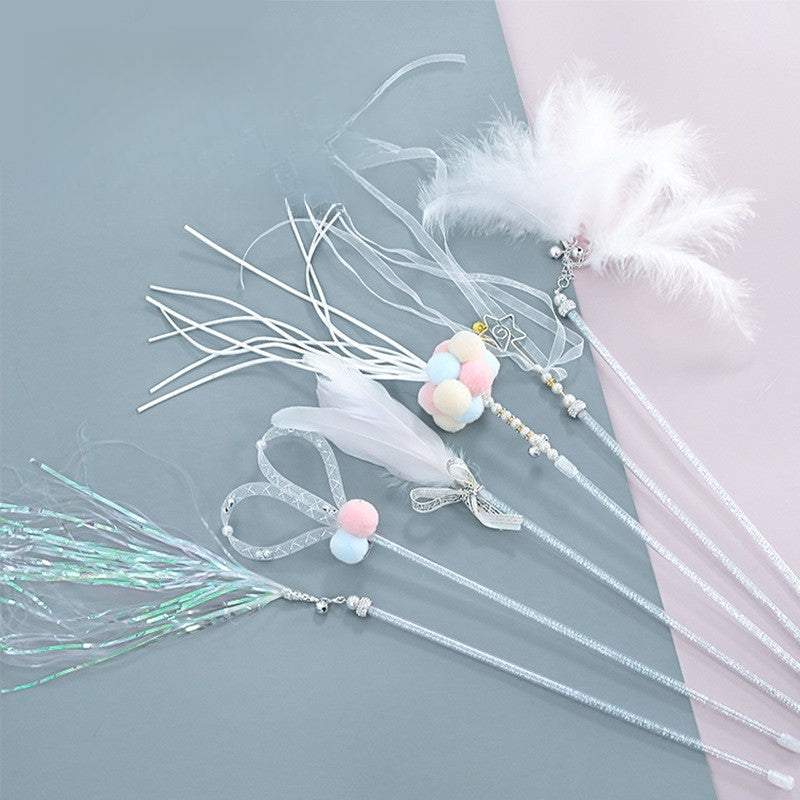 Cat teaser wand toys with feathers and bells for kitten amusement.