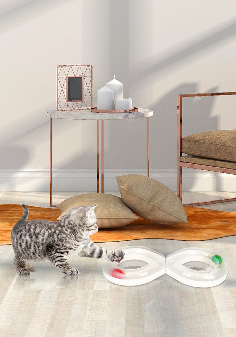 Interactive cat toy set with spinning wheel, teaser wand, and exploration tunnel for kittens.